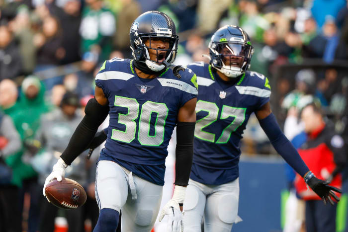 Seattle Seahawks cornerback Mike Jackson (30) celebrates following an interception against the New York Jets during the fourth quarter at Lumen Field.